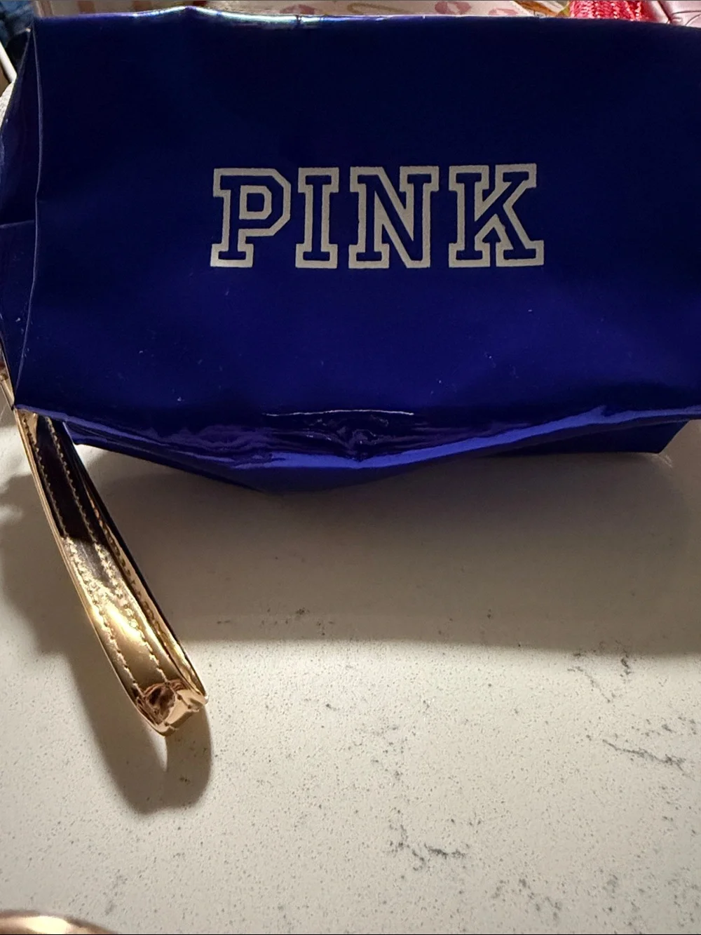 PINK Victoria's Secret Shiny Royal Blue Wristlet with Gold Strap. Dorm essential